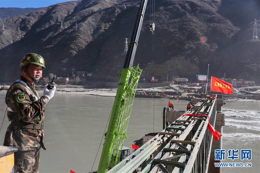 （图文互动）（1）318国道竹巴龙金沙江大桥抢通取得突破性进展 