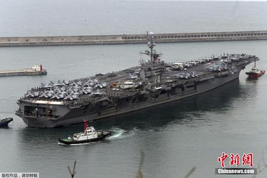 当地时间2016年3月13日，韩国釜山，美国海军“约翰·C·斯坦尼斯”号航母战斗群驶入韩国釜山作战基地，该核航母将参加代号为“关键决心”和“鹞鹰”的韩美联合军演。