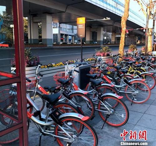 京沪等地共享单车多扎堆城里何时饱和未有答案
