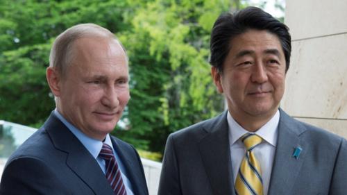 资料图：俄罗斯总统普京与日本首相安倍晋三
