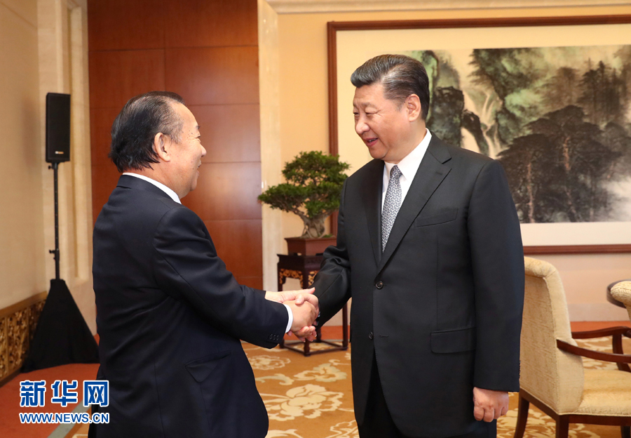 习近平会见日本自民党干事长二阶俊博