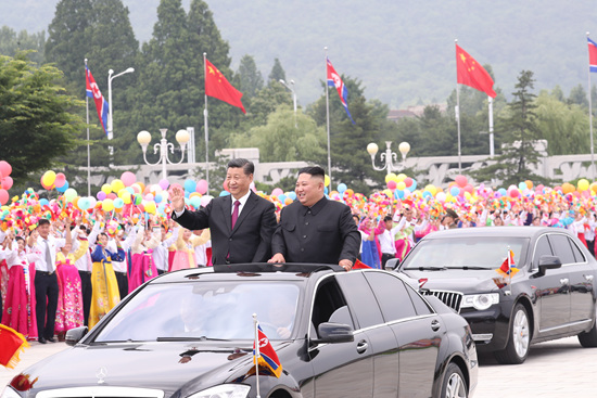 习近平同金正恩举行会谈